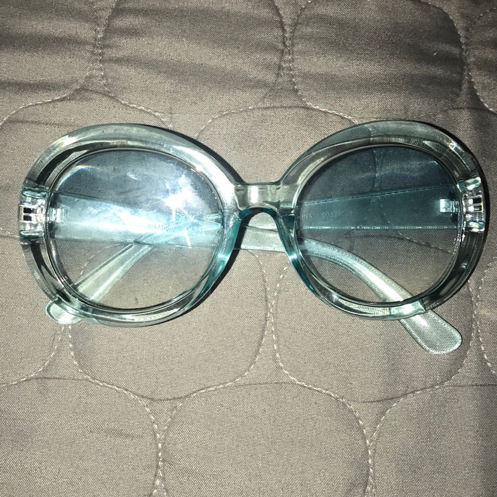 clear blue circled glasses
